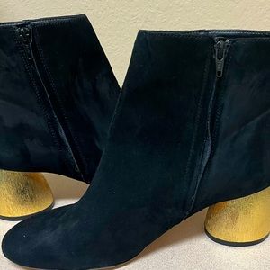 Black suede booties with short gold heel
